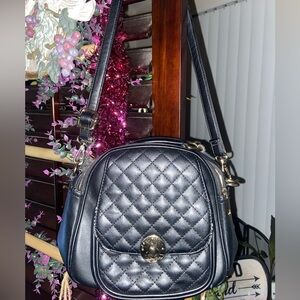 NSK Fashion Crossbody Black Handbag With Gold Buckle Front Pocket Zipper Closure